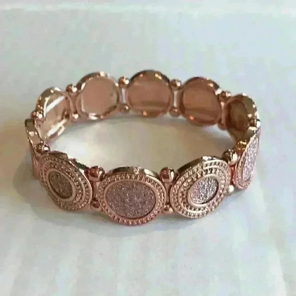 Macy’s new copper colored faux diamond bracelet - Picture 1 of 8